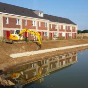 Aanleg waterpartij met keerwanden en duikers